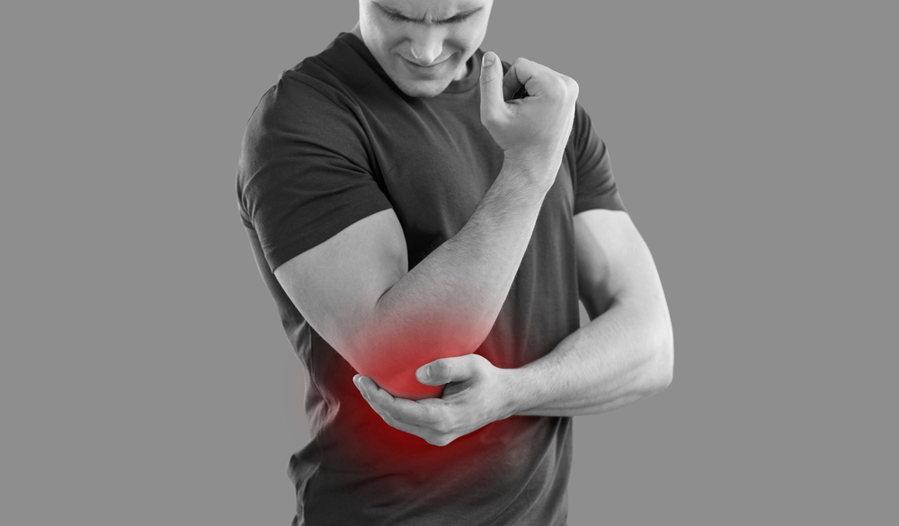 man-suffering-elbow pain man-suffering-elbow pain